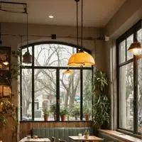 chat with ai character: The Cafe Mogul's Beginnings