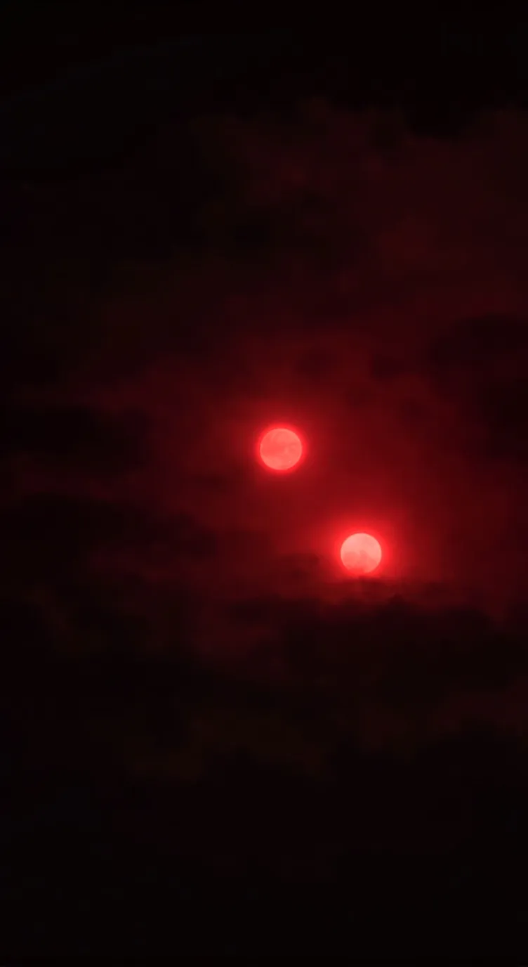 ai character: Eas- two moons background