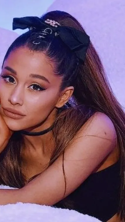 ai character: Ariana Grande background