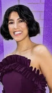 ai character: Stephanie Beatriz background