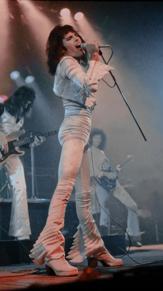 ai character: Freddie Mercury background