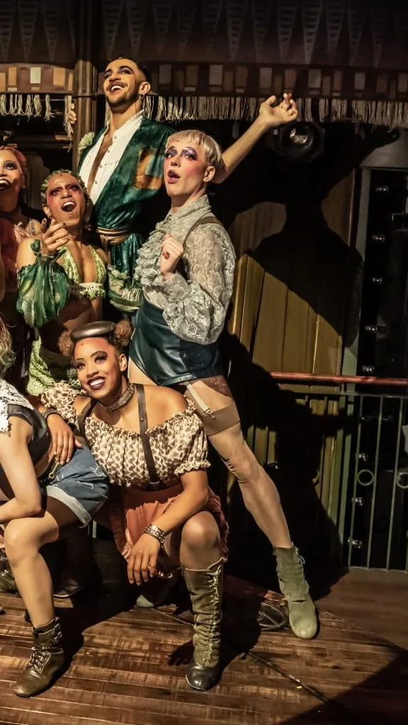 ai character: Kit kat club girls background