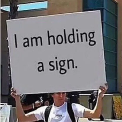 creator guy holding a sign's avatar