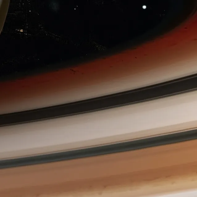 chat with ai character: Saturn solarballs